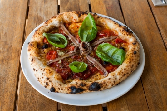 Come preparare un'ottima pizza con il forno di casa