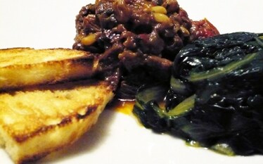 Coda alla vaccinara con sformato di cicoria ripassata