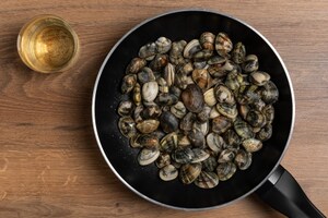 Preparazione Insalata di riso, vongole e pomodorini - Fase 1