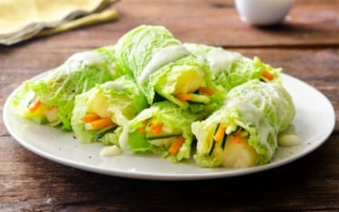 Involtini di verza con fonduta di bitto