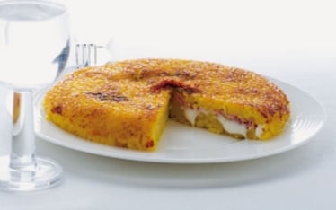 Tortino di risotto giallo gratinato alla mozzarella