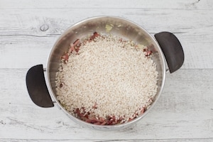 Preparazione Risotto ai mirtilli e speck - Fase 3