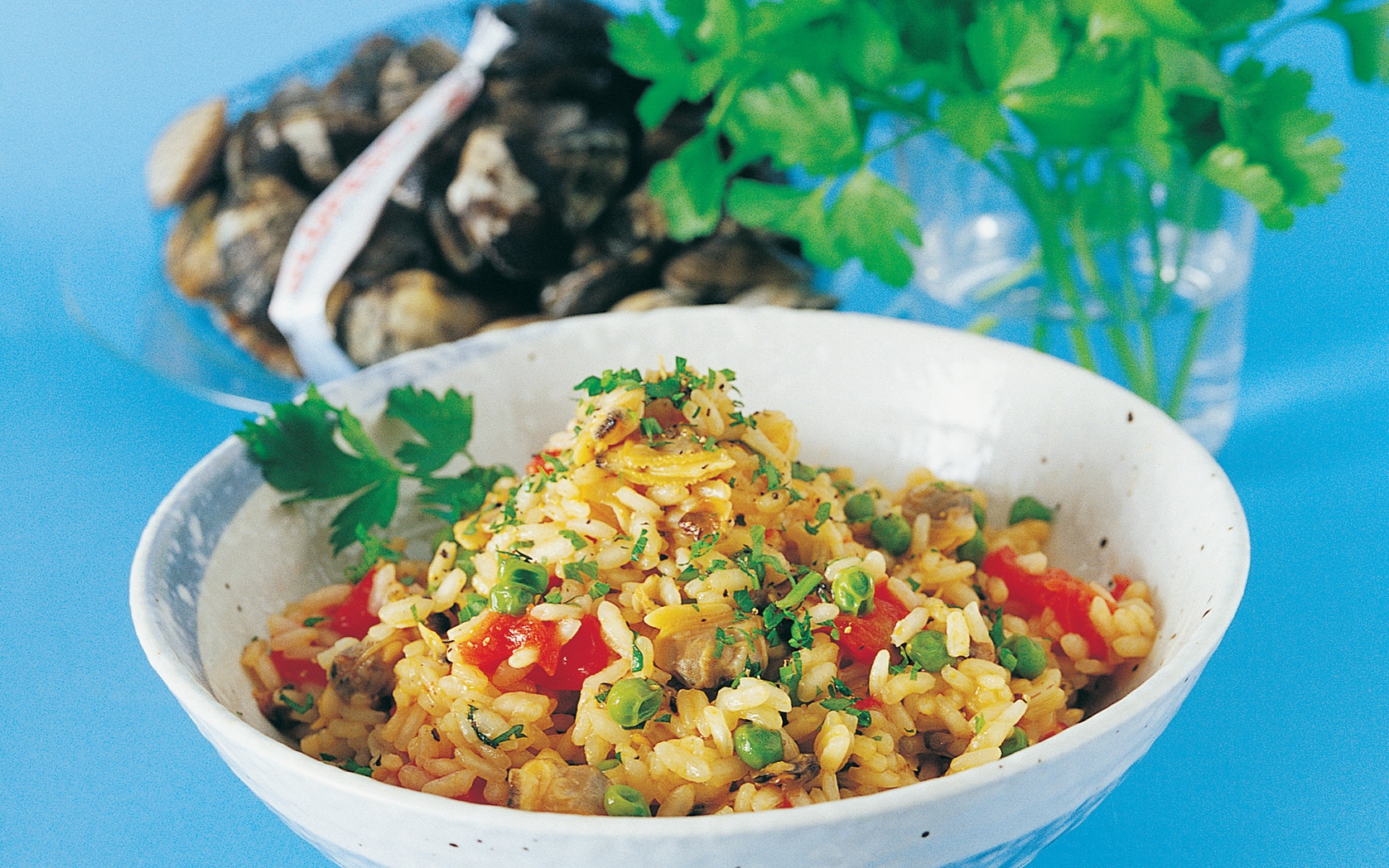 Risotto con vongole e piselli Risotto con vongole e piselli