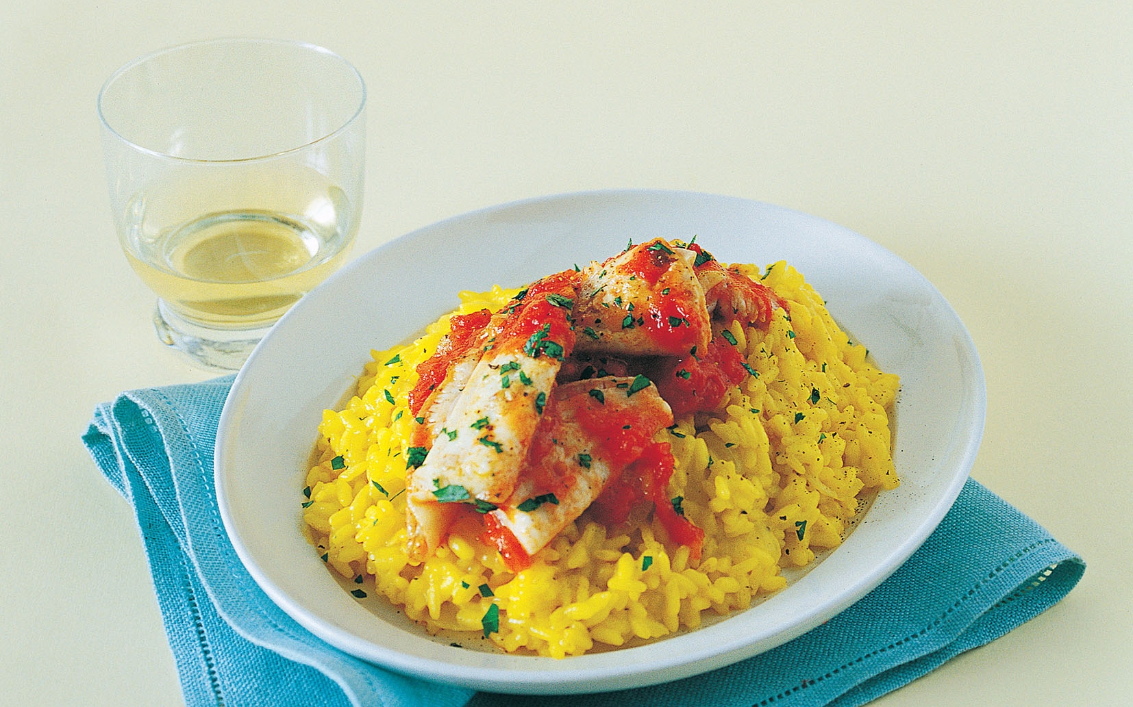 Risotto allo zafferano e filetti di sogliola Risotto allo zafferano e filetti di sogliola