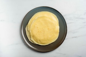 Preparazione Crêpes al prosciutto cotto e besciamella - Fase 2