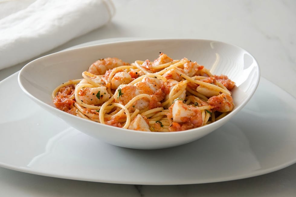 Spaghetti al sugo di scampi e capesante ricetta