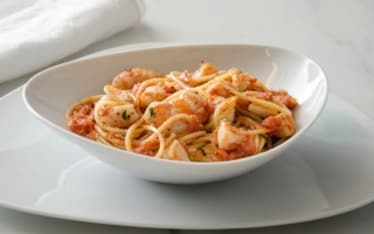 Spaghetti al sugo di scampi e capesante