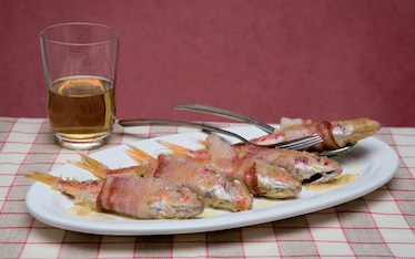 Triglie al prosciutto in forno