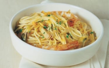 Spaghetti con gamberi e carciofi