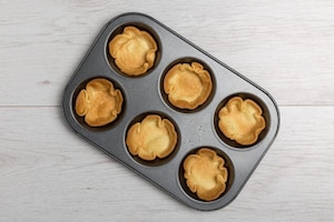 Preparazione Cestini di pasta brisée ripieni con crema al Grana Padano DOP - Fase 3