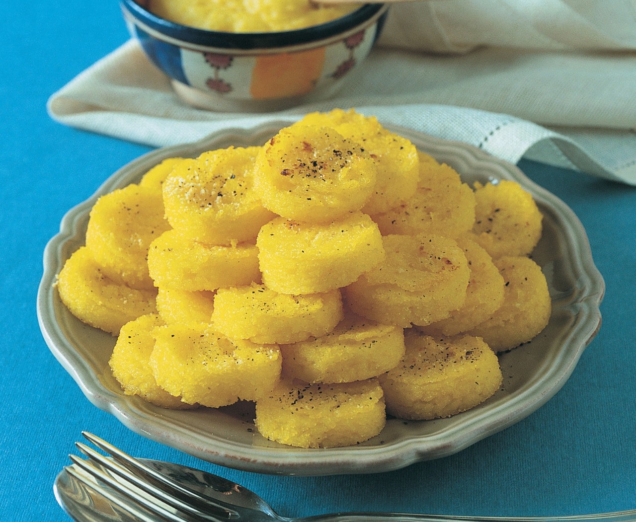 Piramide di polenta alla crema di baccalà ricetta