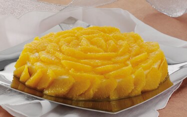 Spuma d'arancia con salsa al rum