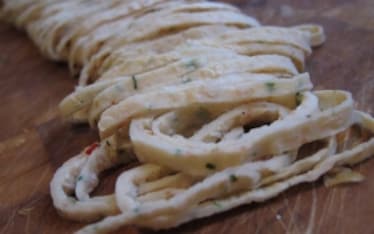 Tagliolini di gamberi e consommè di calamaro