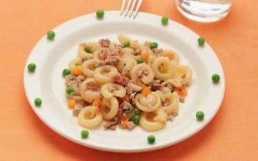 Dischi volanti al ragù bianco con piselli