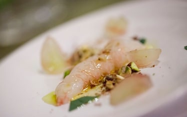 Scampi infornati e uva