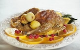 Faraona arrosto, arance e ribes