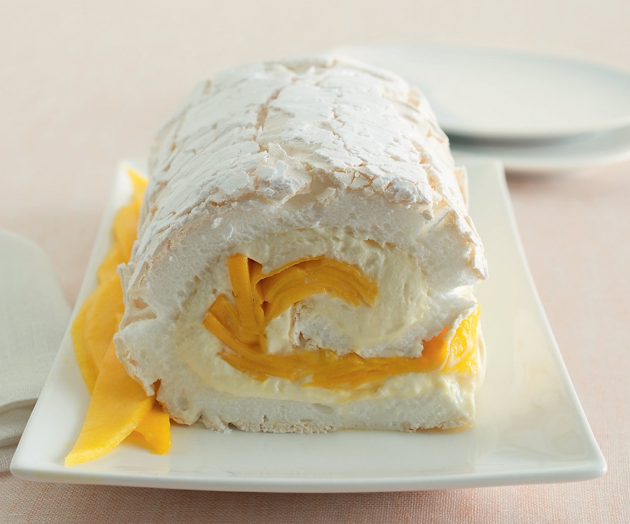 Rotolo di meringa con mango e passion fruit ricetta