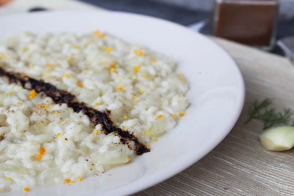 Risotto al finocchio con scorza d’arancia e liquerizia ricetta