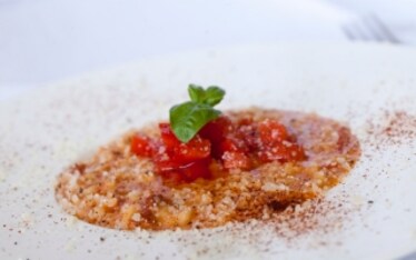 Riso ai tre pomodori con olio e polvere di peperone