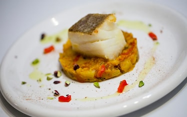 Baccalà su purè di verdure e pistacchi