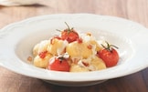 Gnocchi di patate con pomodori freschi, speck e Formaggio Stelvio