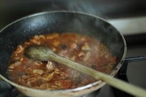 Preparazione Crostini con calamaretti all'uvetta - Fase 2