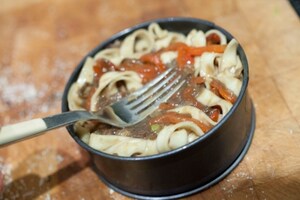Preparazione Timpano di tagliatelle, peperoni e acciughe - Fase 8