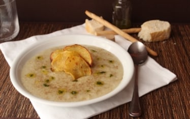 Crema di topinambur con olio alle erbe