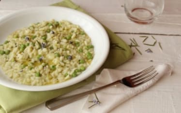 Risotto con fave e piselli al rosmarino