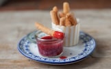 Churros con salsa di fragole