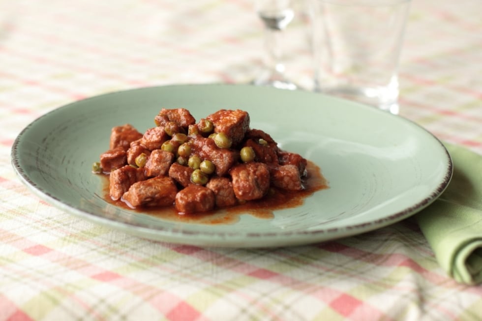 Spezzatino di maiale con piselli ricetta