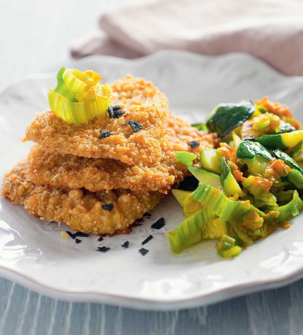 Cotolettine in crosta di parmigiano con zucchine ricetta