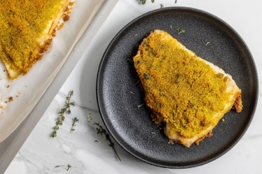 Pesce persico al forno con erbe aromatiche