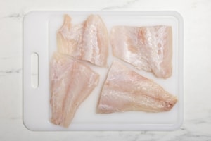 Preparazione Pesce persico al forno con erbe aromatiche - Fase 1