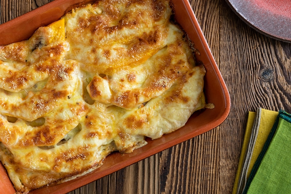 Gratin di pane, zucca e formaggio ricetta