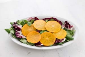 Preparazione Insalata con melagrana e cachi mela - Fase 5