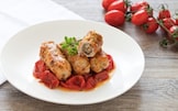 Involtini di vitello con mozzarella e pomodorini confit