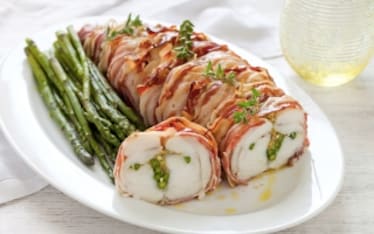 Arrosto di rana pescatrice ripieno di asparagi e pistacchi