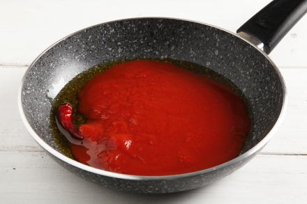 Preparazione Totani ripieni al sugo - Fase 4 Preparazione Totani ripieni al sugo - Fase 4