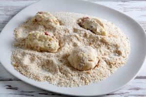 Preparazione Polpette al formaggio al forno - Fase 2