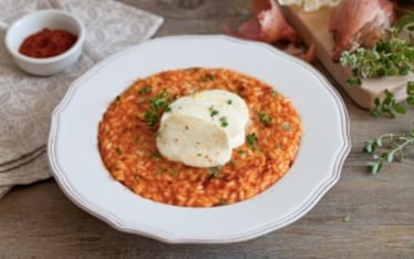 Risotto al pomodoro, mozzarella ed erbette