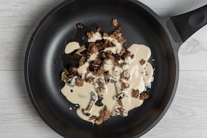 Preparazione Tagliatelle al sugo di funghi, salsiccia e zafferano - Fase 2