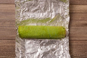 Preparazione Rotolo di frittata al prosciutto e formaggio - Fase 6