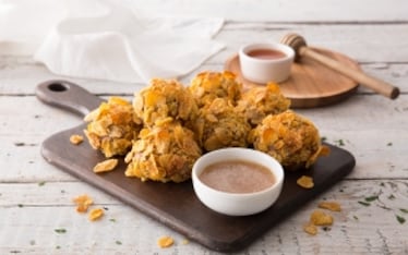 Polpette con panatura di corn flakes e salsa al miele di castagno e birra