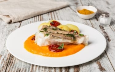 Rana pescatrice al forno con crema alla zucca e curry