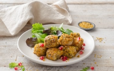 Bocconcini di maiale in crosta di polline e semi di papavero