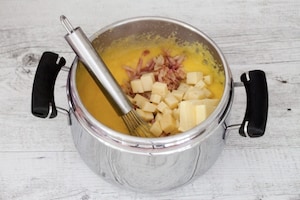 Preparazione Polenta concia con formaggio e speck - Fase 2