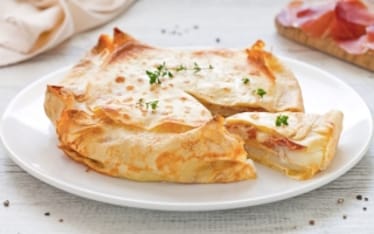 Gratin di crepes al prosciutto e fontina
