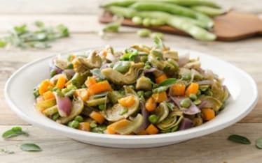 Padellata di piselli e fave con verdure