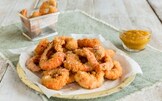 Gamberi fritti al cocco con salsa all'arancia 